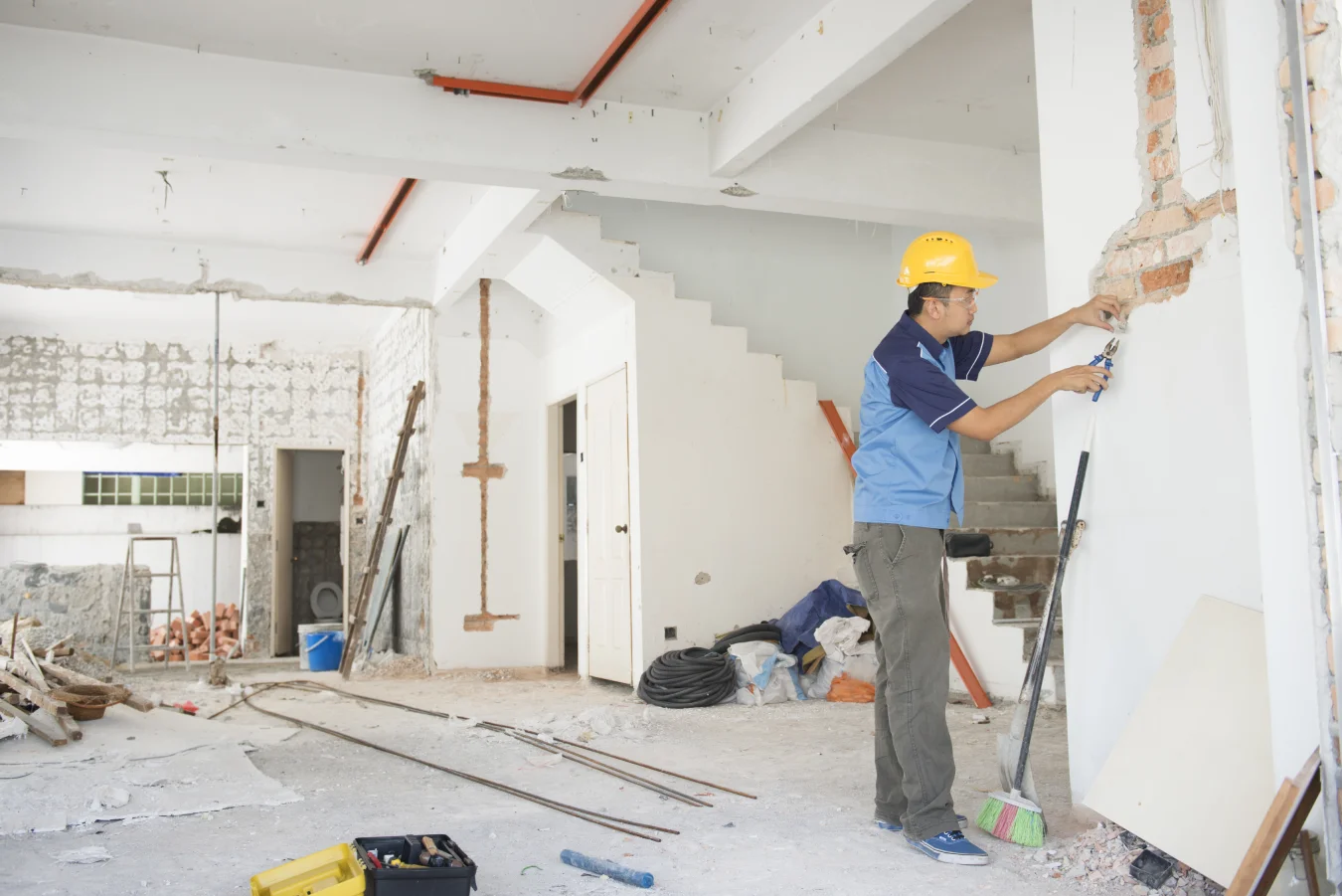 A man working for an interior design firm working on a residential project