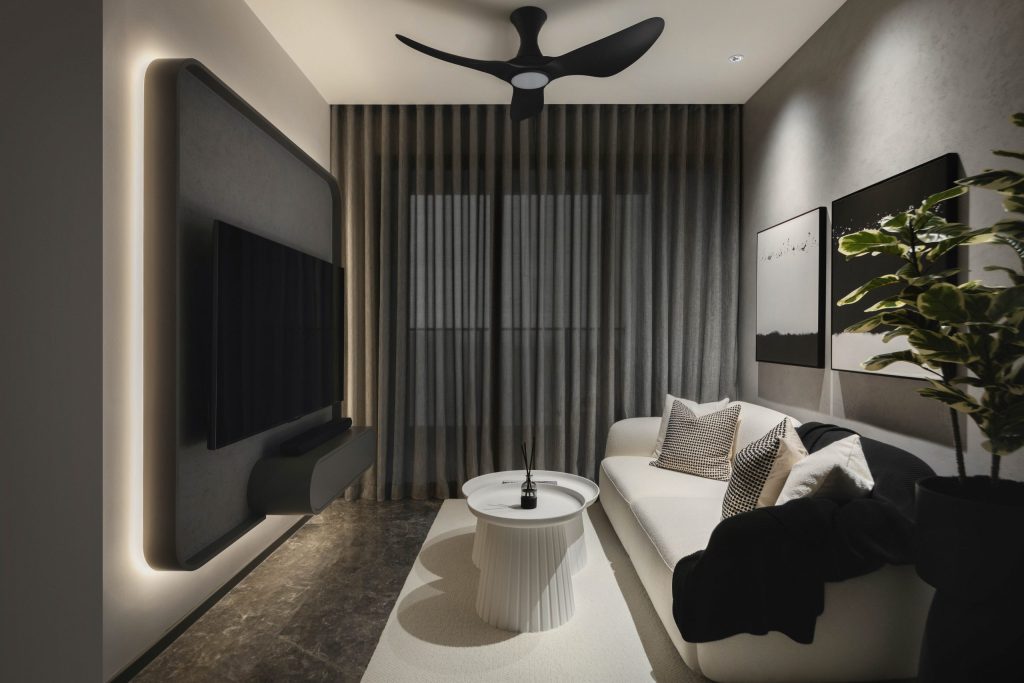 "A gray, contemporary living room with an overhead fan and grey blinds and an indoor plant."